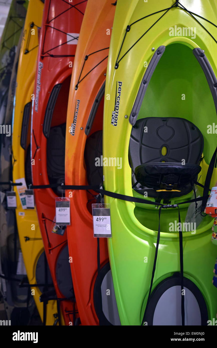 Colorful kayaks for sale at Dick's Sporting Goods, a large store at the Roosevelt Field Mall in Garden City, Long Island Stock Photo