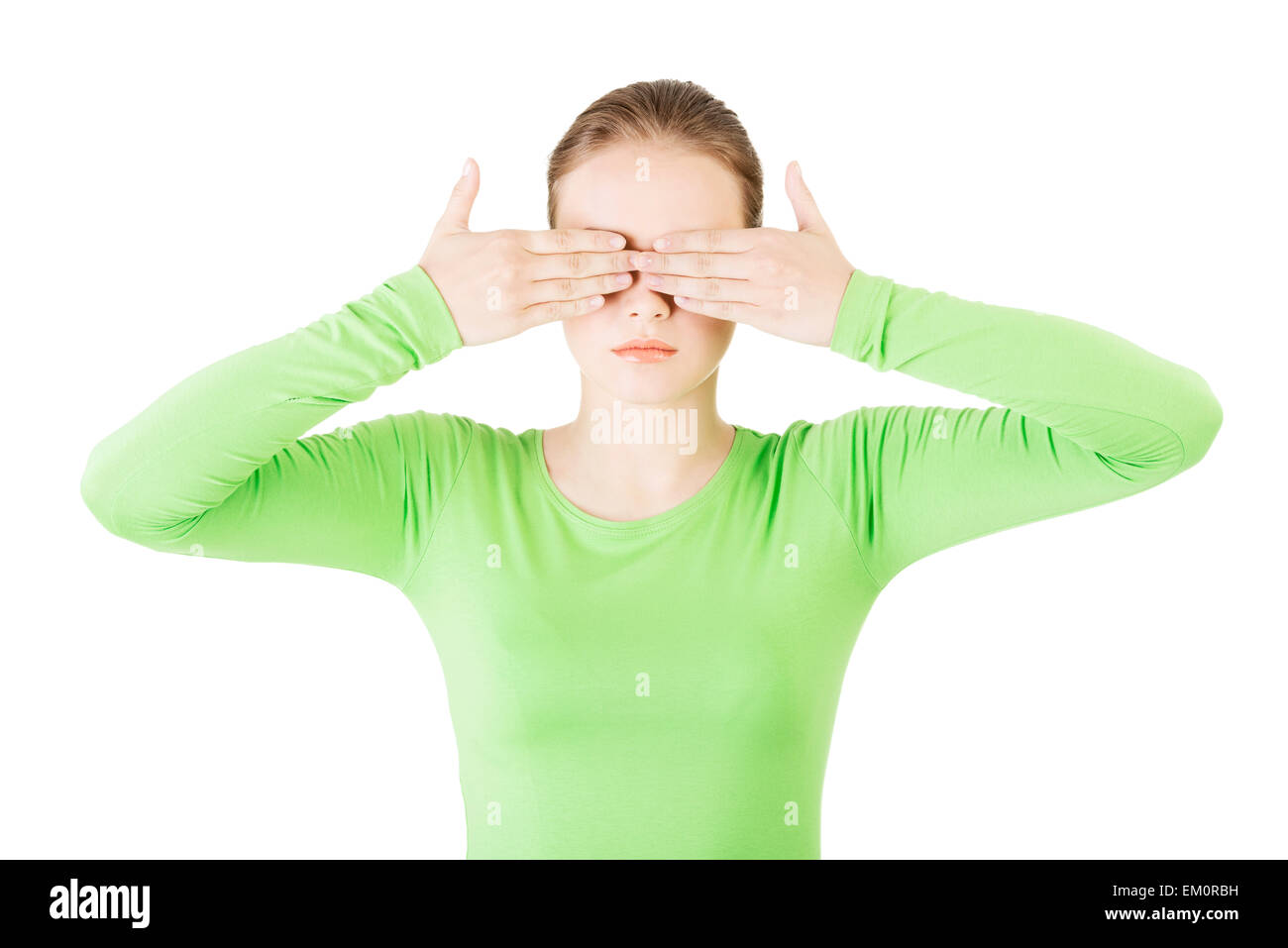 Young teen woman covering her face with hands Stock Photo - Alamy