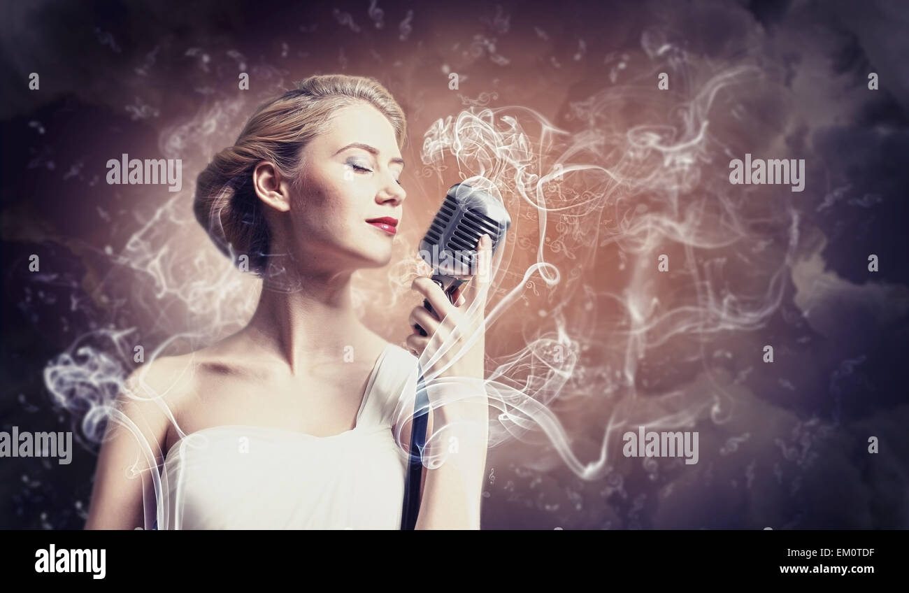 Female blonde singer Stock Photo - Alamy