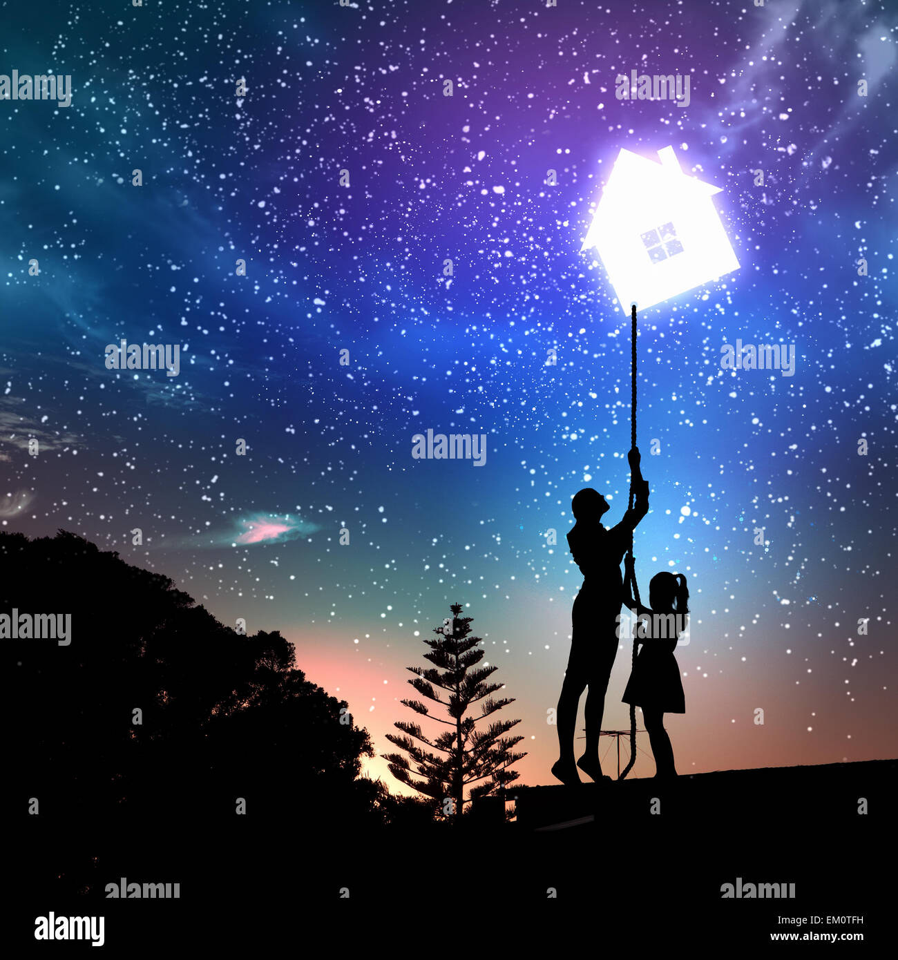 Family pulling rope with a symbol of house Stock Photo - Alamy