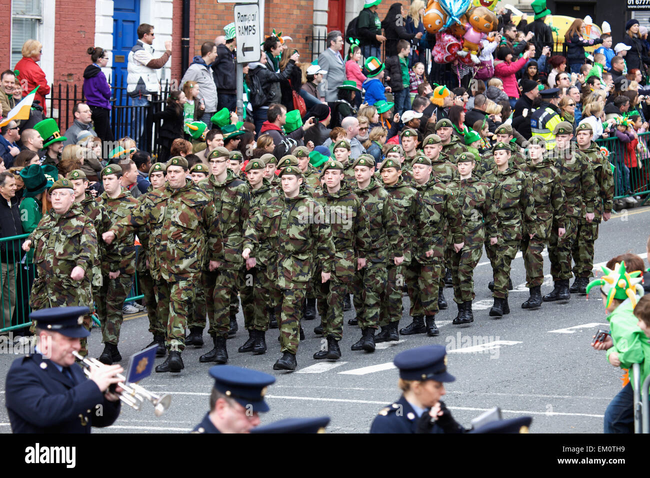 A Military March And Marching Band In The Saint Patrick's Day Parade; Dublin Ireland Stock Photo