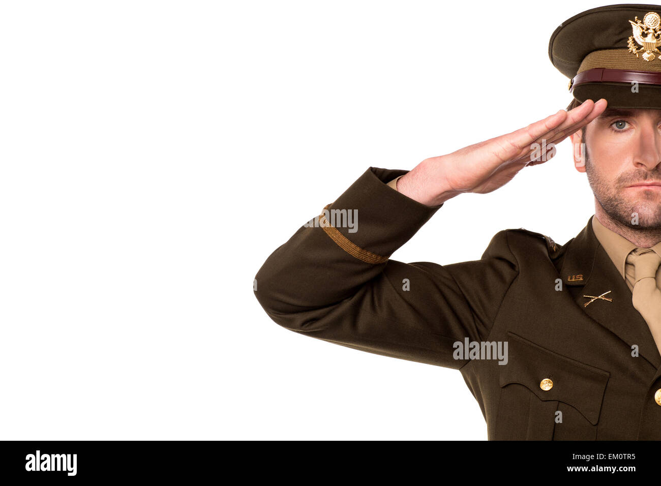 Portrait of a patriotic soldier saluting Stock Photo