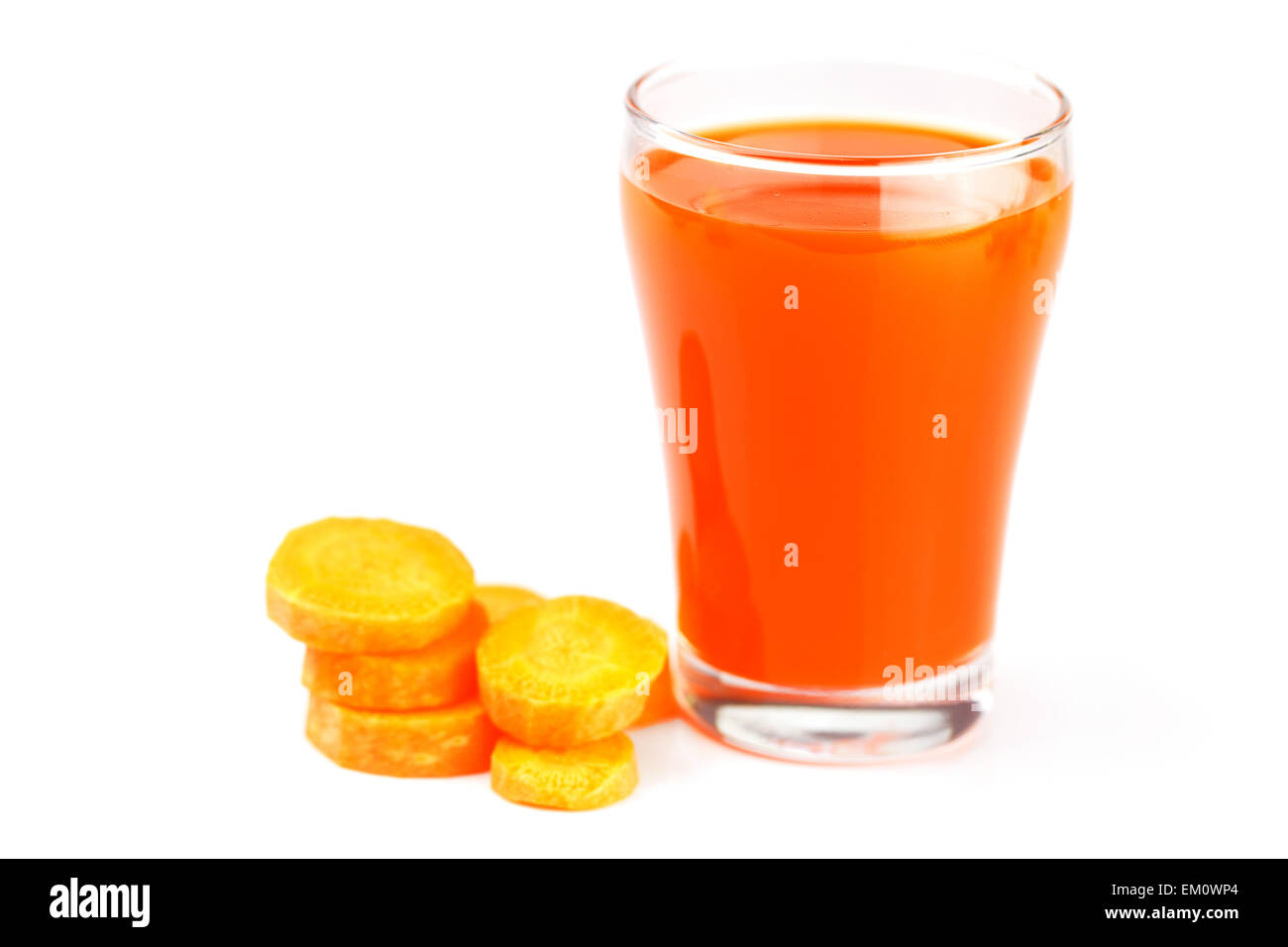 carrot and a glass of carrot juice isolated on white Stock Photo Alamy