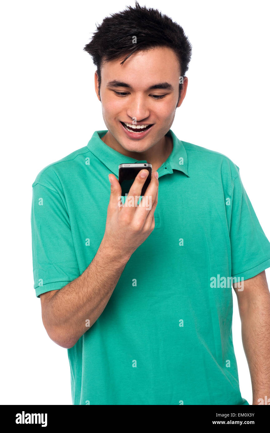 Guy exicted about his cellphone Stock Photo