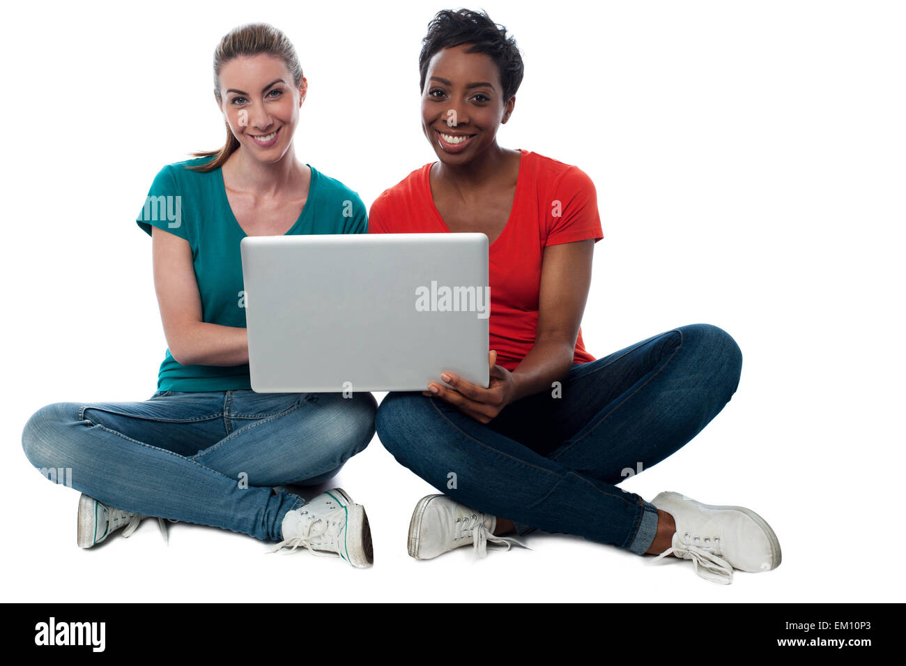 Women browsing on laptop Stock Photo - Alamy