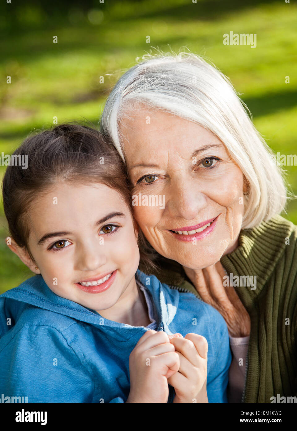 Girl With Grandmother At Campsite Stock Photo