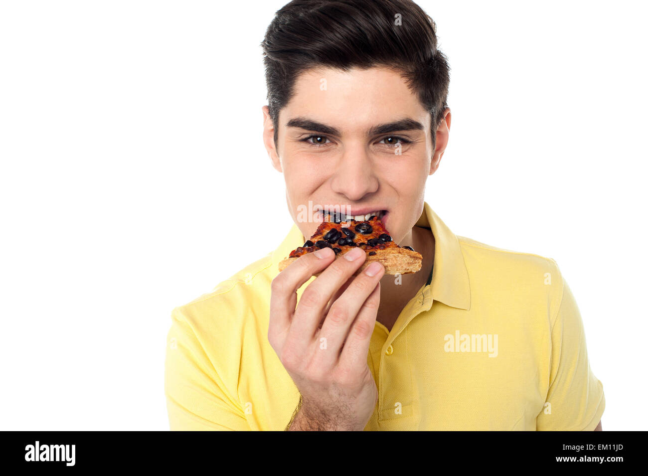 Smart looking guy enjoying pizza slice Stock Photo Alamy