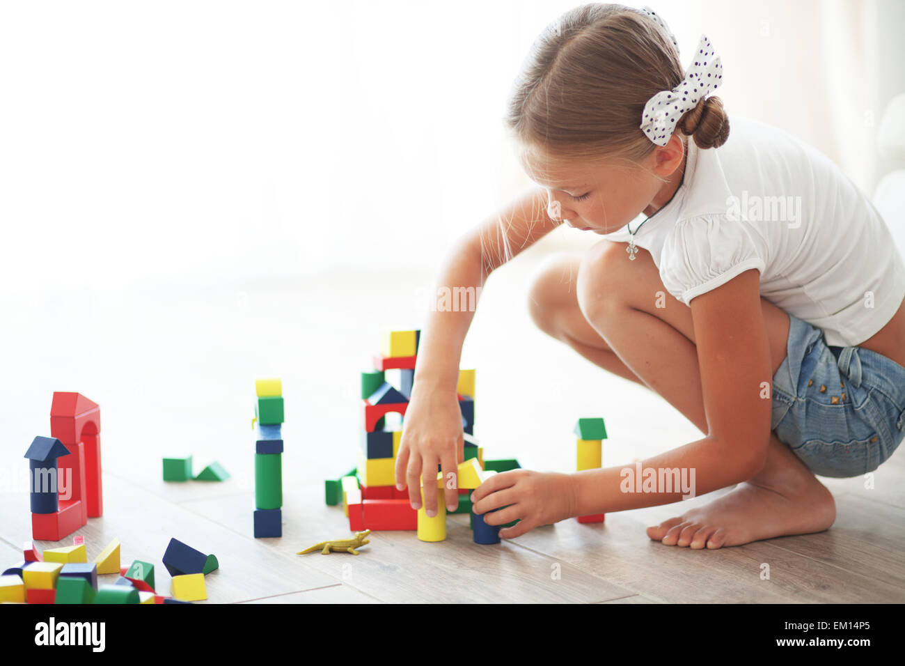 Child playing with blocks Stock Photo - Alamy