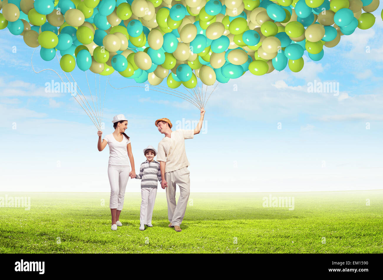 Happy young family Stock Photo - Alamy