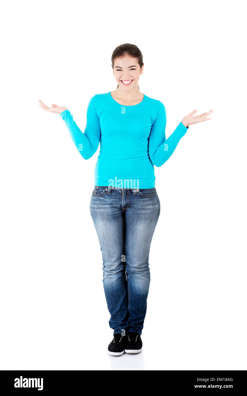 Happy , excited young woman presenting copy space on her palm Stock ...