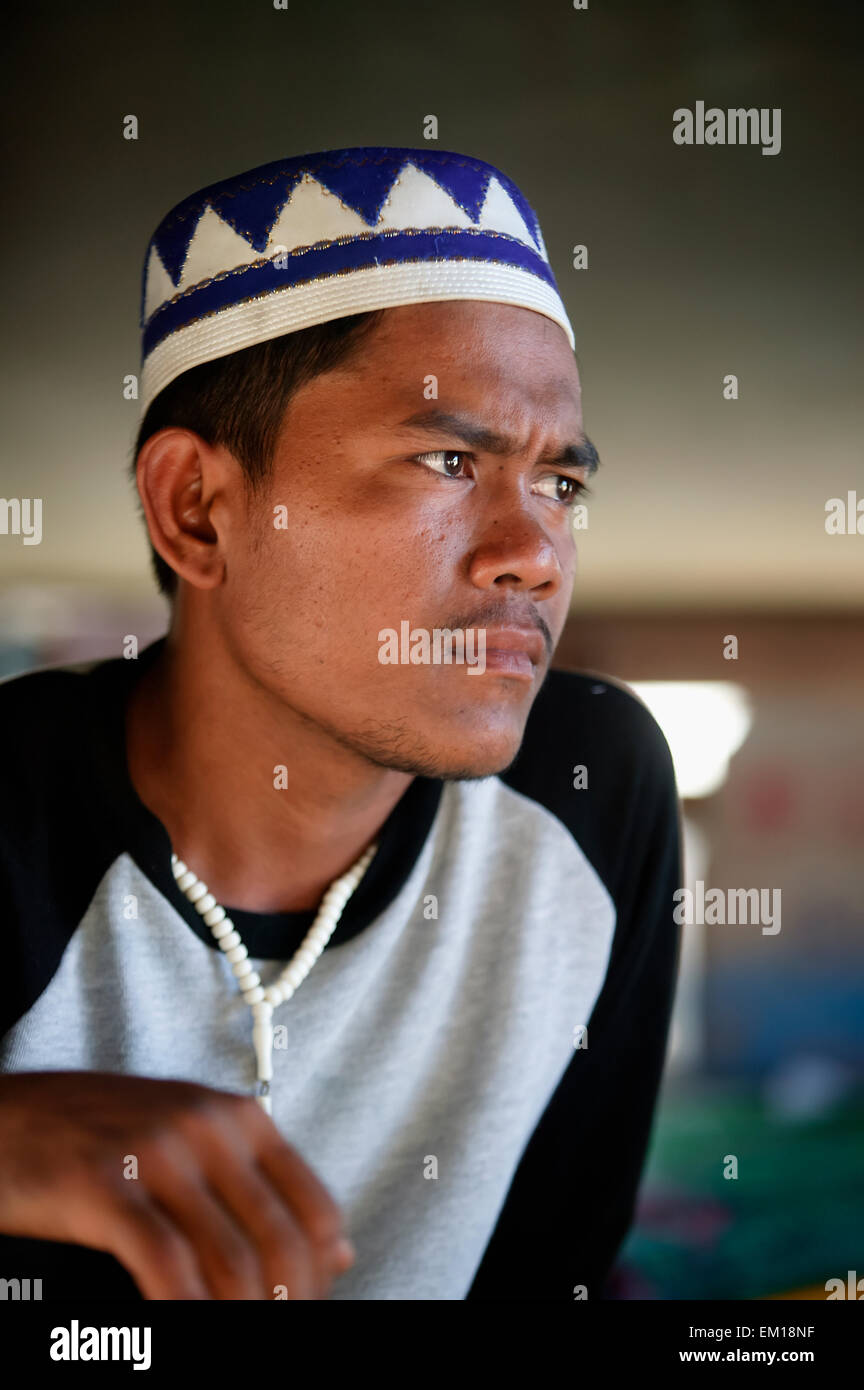 Portrait of a young muslim man, Leupung Village; Aceh Province, Sumatra, Indonesia Stock Photo