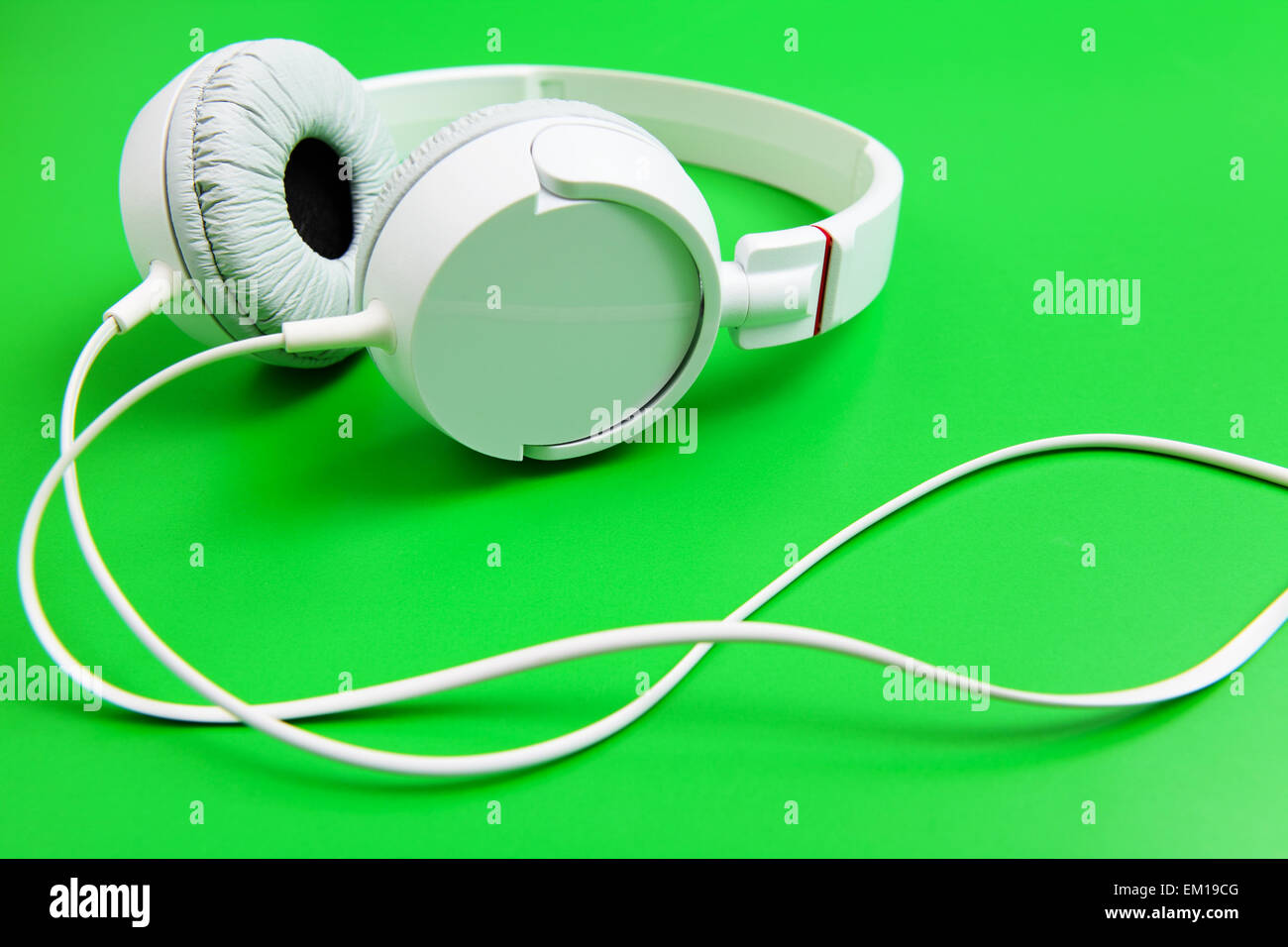 Headphone on green background Stock Photo Alamy