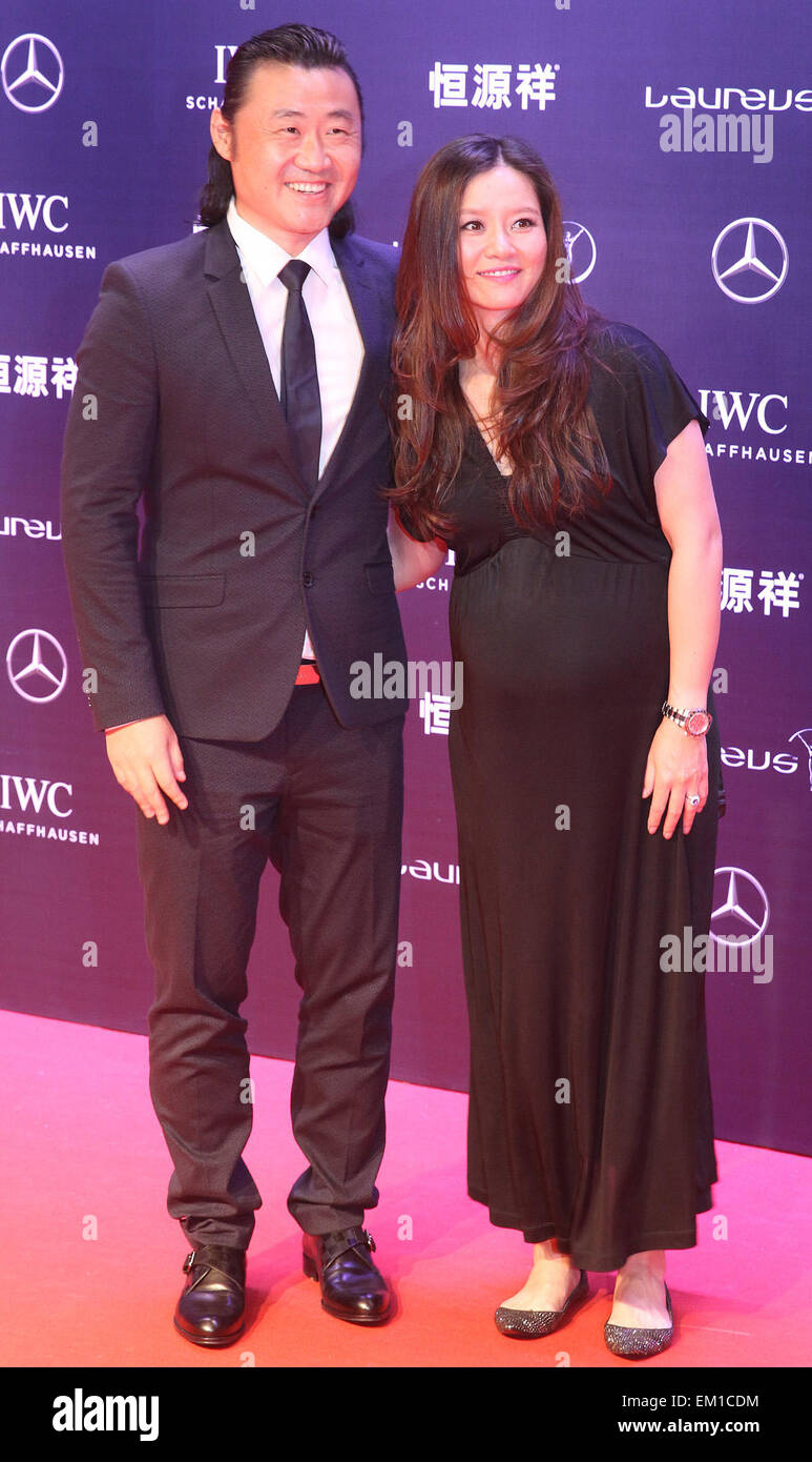 Shanghai. 15th Apr, 2015. Retired Chinese tennis star Li Na (R) and her husband Jiang Shan pose on the red carpet for the Laureus World Sports Award ceremony at the Grand Theater in Shanghai on April 15, 2015. Credit:  Chen Fei/Xinhua/Alamy Live News Stock Photo