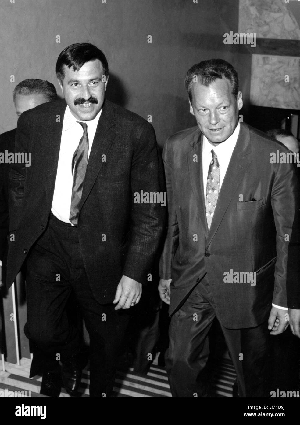 (FILE) - An archive picture, dated 4 September 1965, shows German author Guenter Grass (l) and then-German Chancellor candidate Willy Brandt (SPD) on their way to a reception in Bayreuth, Germany. Goettingen-based publishing house Steidl confirmed on 13 April 2015 the death of Guenther Grass. Photo: Heinz-Juergen Goettert/dpa Stock Photo