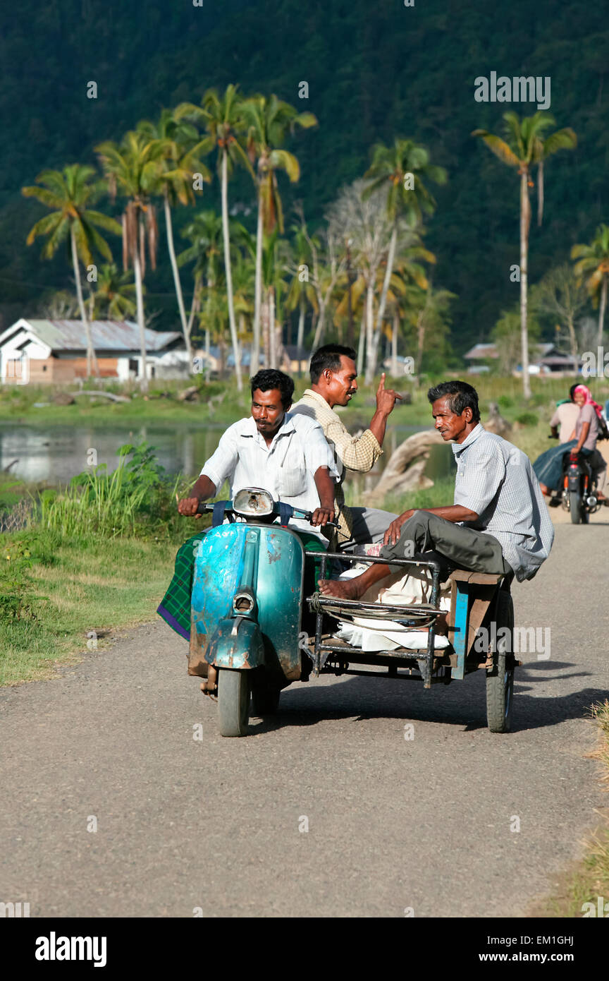 A motorbike tricycle taxi, near Lamno, after the Indian Ocean tsunami in December 2004; Lamno, Aceh Province, Sumatra, Indonesia Stock Photo