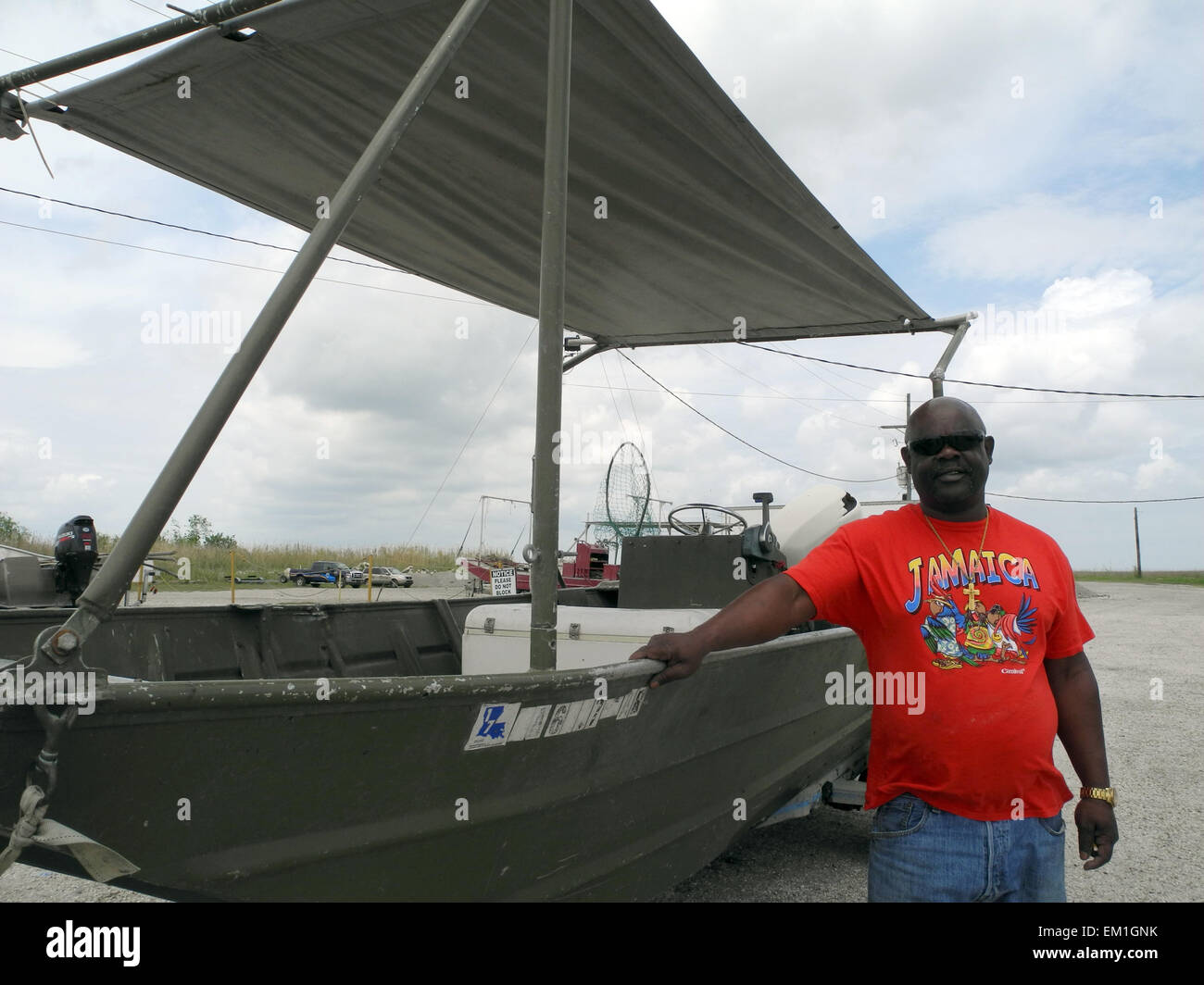 Fisherman Orin Bentley stands next to his fishing boat shows in Pointe à la Hache near New Orleans, US, 6 April 2015. Bentley left the crab fishing business in 2012. Pointe à la Hache is situated at the eastern side of the Mississippi delta, which was the hardest hit area after the Deepwater Horizon oil spill. Bentley was forced to take the 140 000 dollars offered by oil company BP, the largest amount of money he every had in his hand. 20 April 2015 marks the 5th anniversary of the Deepwater Horizon catastrophe in the Gulf of Mexico which took place on 20 April 2010. Photo: Johannes Schmitt Stock Photo