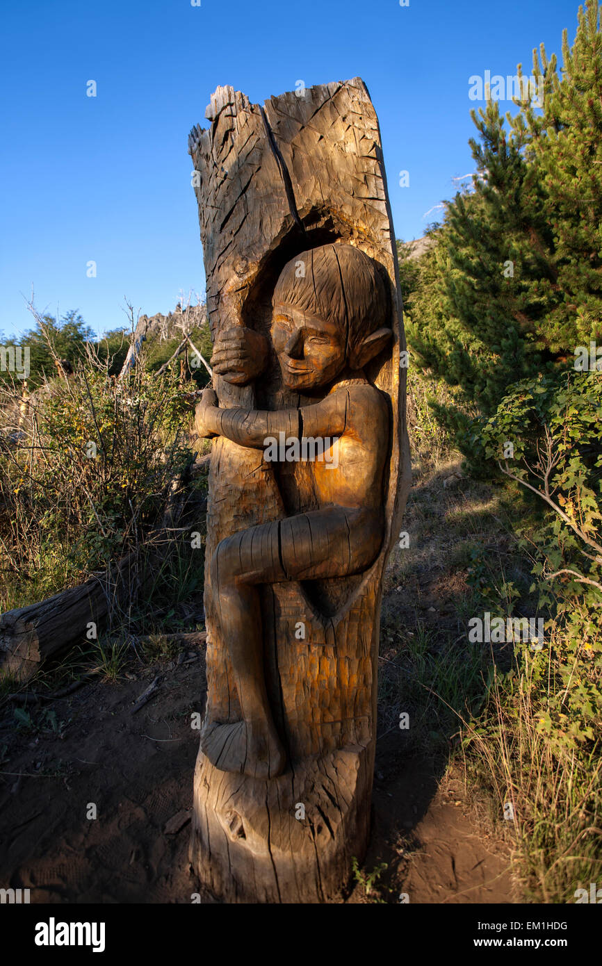 Carved sculpture in a tree. El Bosque tallado (The Carved forest). El