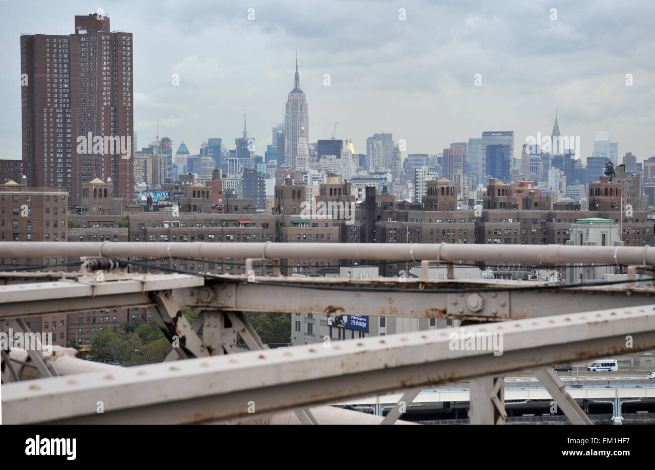 Empire State Building and Chrysler Building among the New York Skyline seen from the Brooklyn Bridge Stock Photo