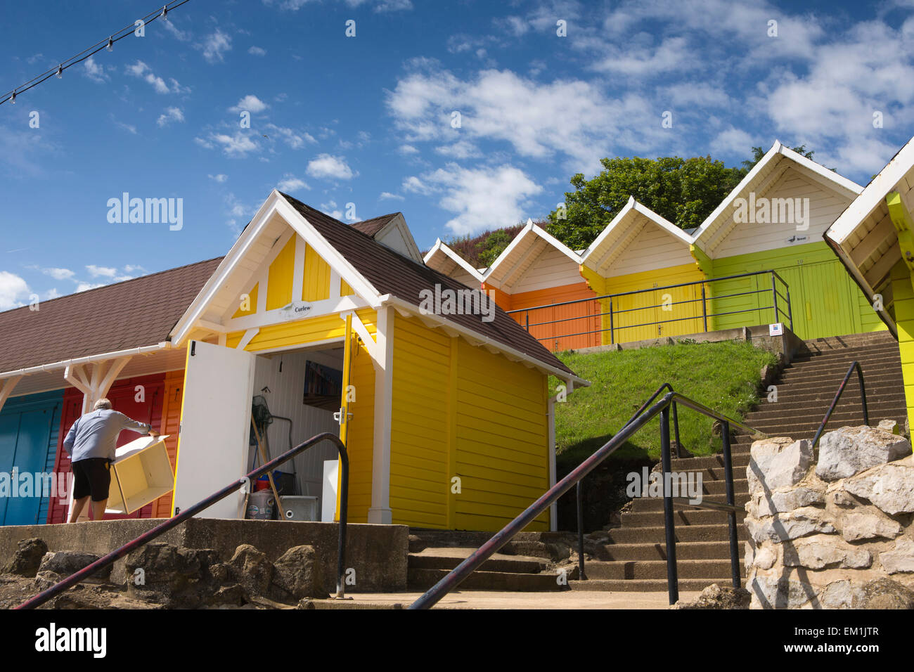 UK, England, Yorkshire, Scarborough, North Bay Promenade, colourfully painted beach huts Stock Photo