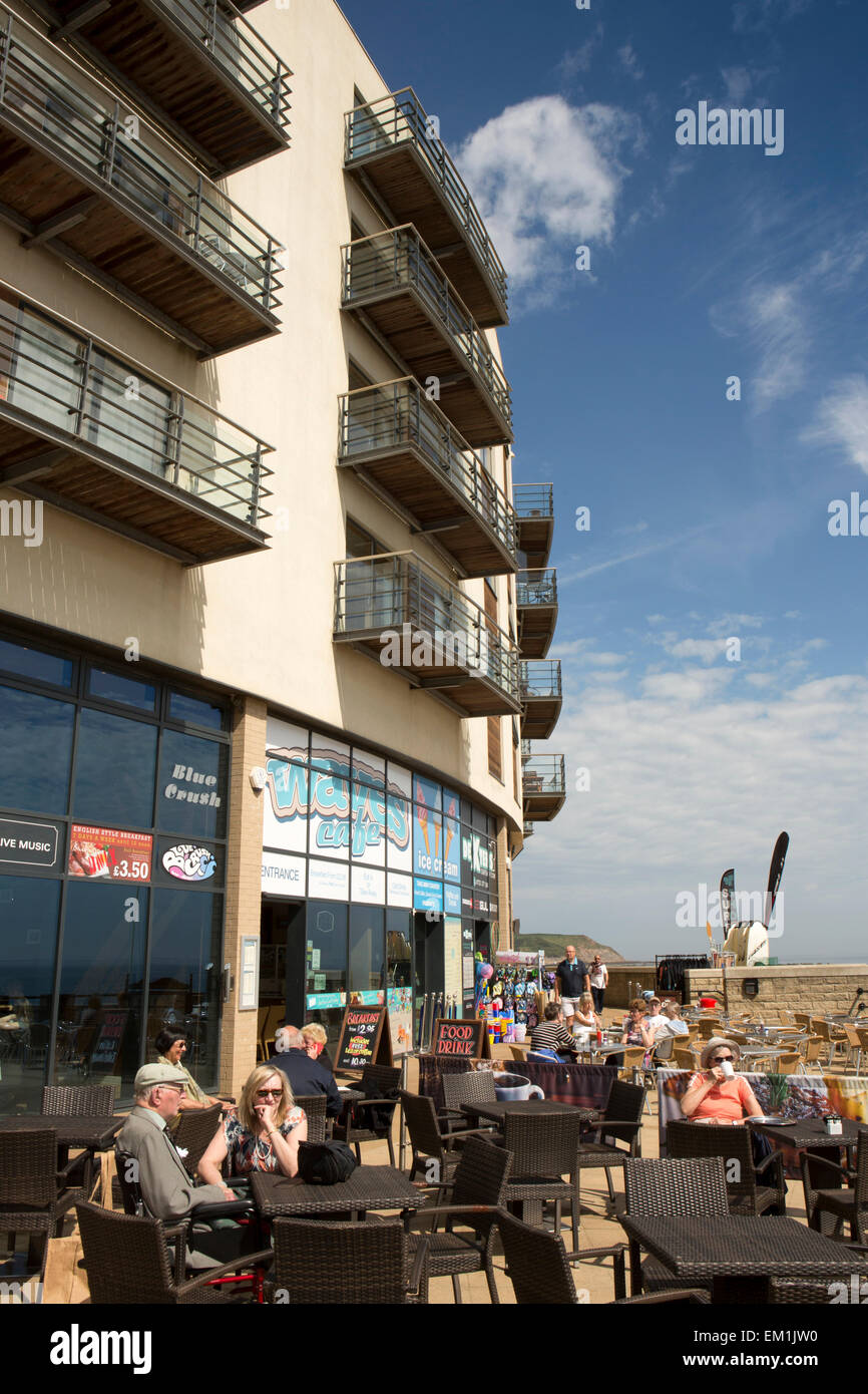 UK, England, Yorkshire, Scarborough, North Bay Promenade, cafe customers sitting outside in sunshine Stock Photo