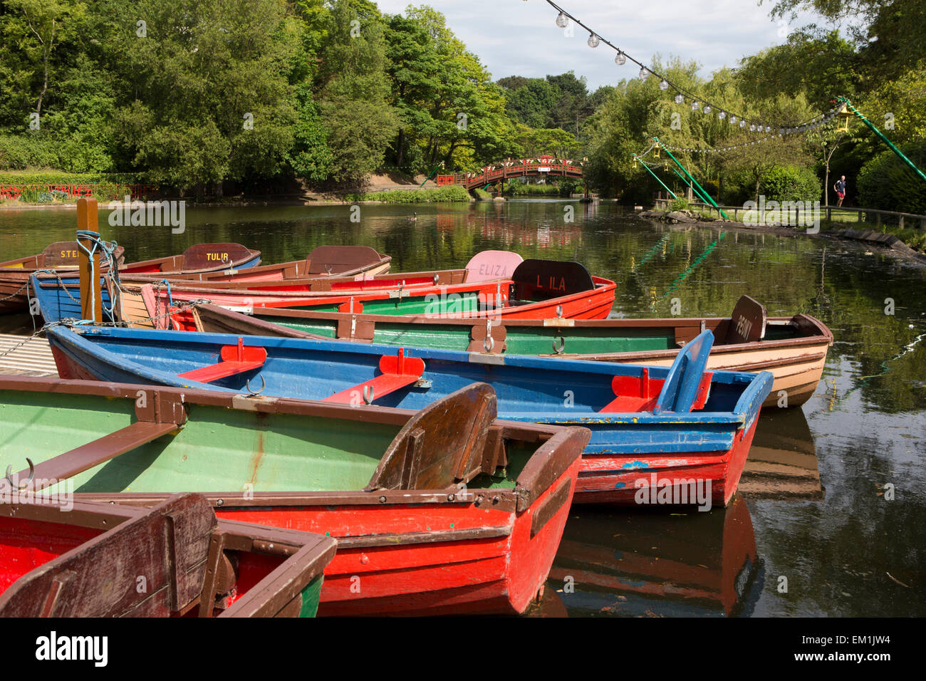UK, England, Yorkshire, Scarborough, Peasholm Park boating lake, rowing boats and Chinese bridge Stock Photo