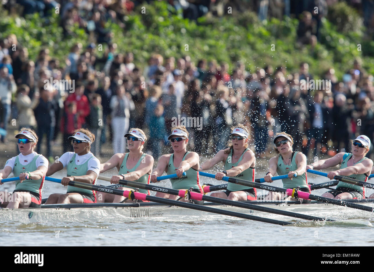 11.04.2015. Oxford University Women's Boat Club (OUWBC) [dark blue] and Cambridge University Women's Boat Club (CUWBC) [light blue] make history by competing in the first ever women’s race to be held on the traditional Men’s Tideway course between Putney and Mortlake.  OUWBC crew:- Bow: Maxie Scheske, 2: Anastasia Chitty, 3: Shelley Pearson, 4: Lauren Kedar, 5: Maddy Badcott, 6: Emily Reynolds, 7: Nadine Graedel Iberg, Stroke: Caryn Davies, Cox: Jennifer Her.  CUWBC crew:- Bow: Fanny Belais, 2: Ashton Brown, 3: Caroline Reid, 4: Claire Watkins, 5: Melissa Wilson, 6: Holly Hill, 7: Daphne Marts Stock Photo