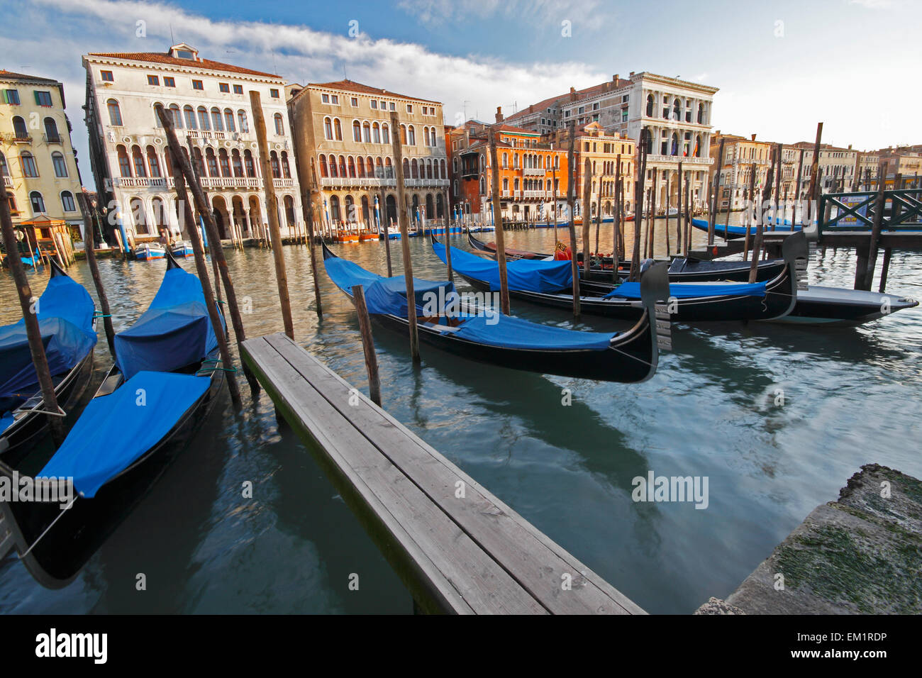 Gondolas Moored On The Grand Canal; Venice Italy Stock Photo