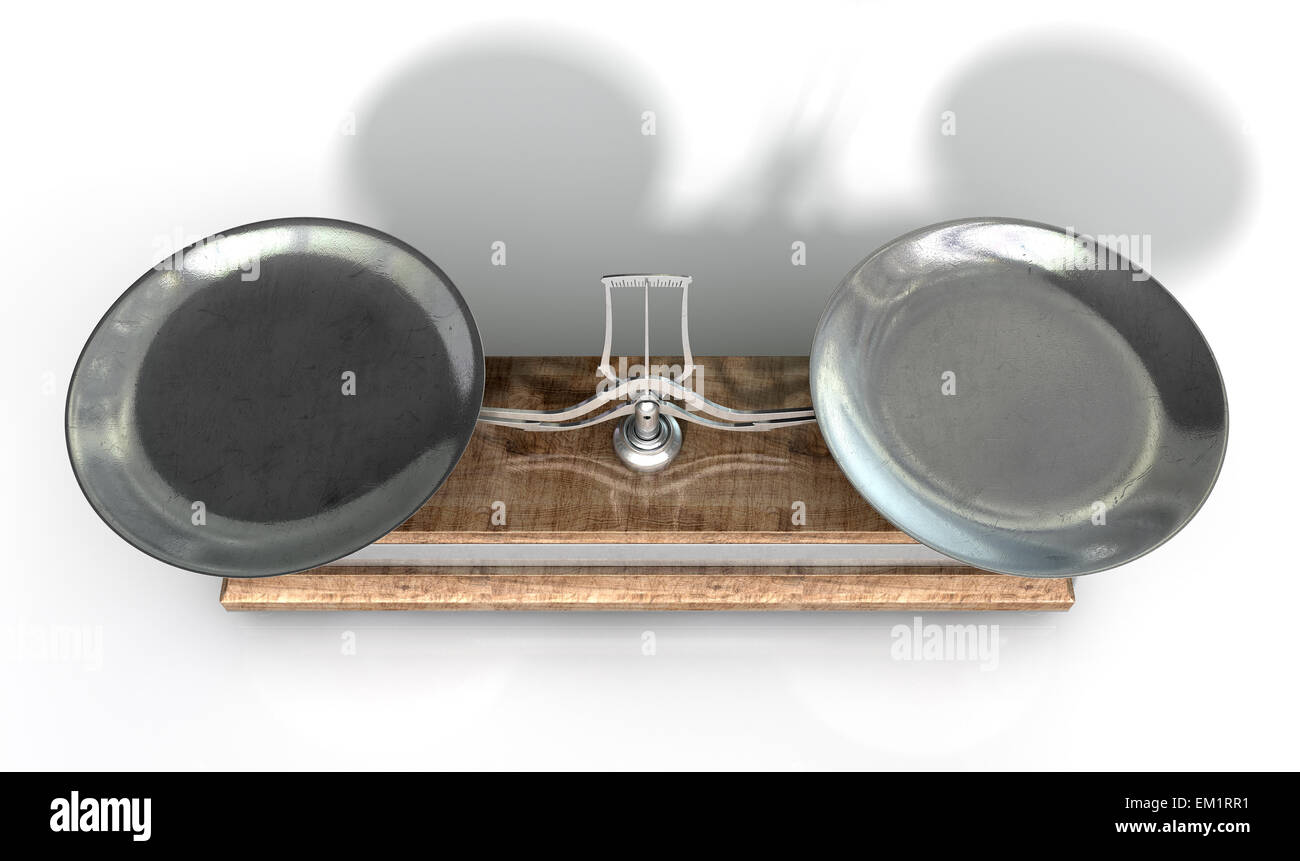 An empty old metal and wood two pan balance scale on an isolated white background Stock Photo