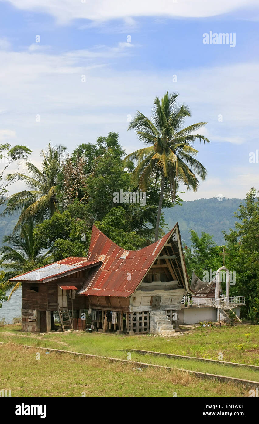 Traditional Batak house on Samosir island, Sumatra, Indonesia, Southeast Asia Stock Photo
