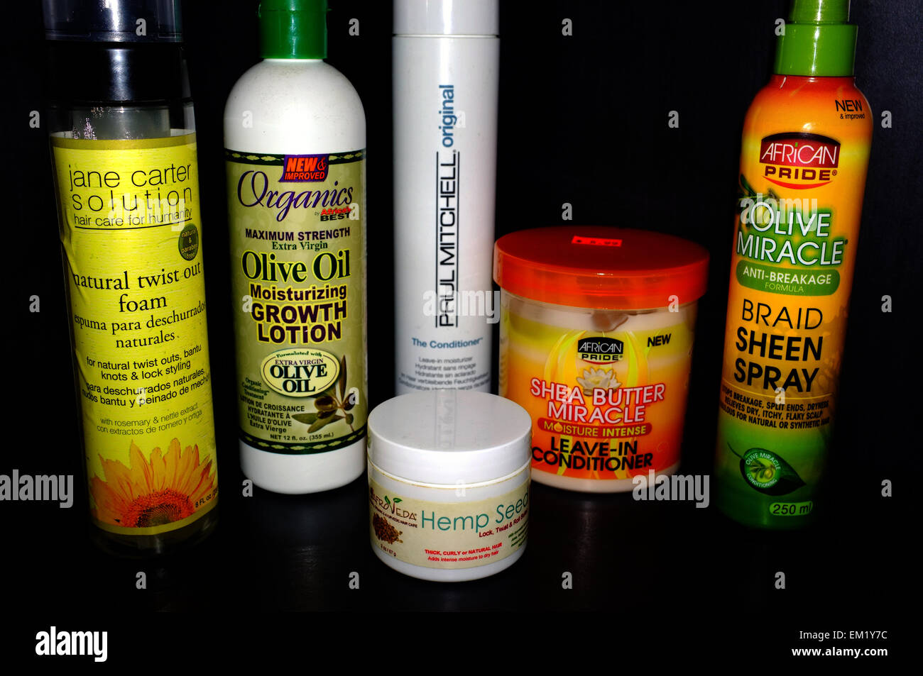 Black Hair Natural Products Photographed Against A Black
