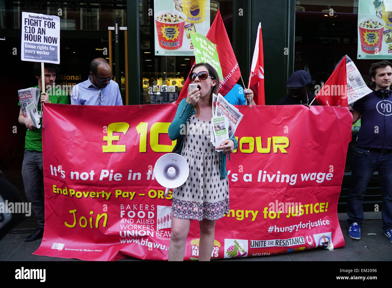 London, UK.15th April, 2015. Protesters picketed the Whitehall branch of Fast food giant McDonald's during the 'Were Not Loving It - McDonalds Low Pay is Not OK' global day of action organised by Fast Food Rights, campaigning for workers at the fast food giant to be paid a living wage. Credit:  See Li/Alamy Live News Stock Photo