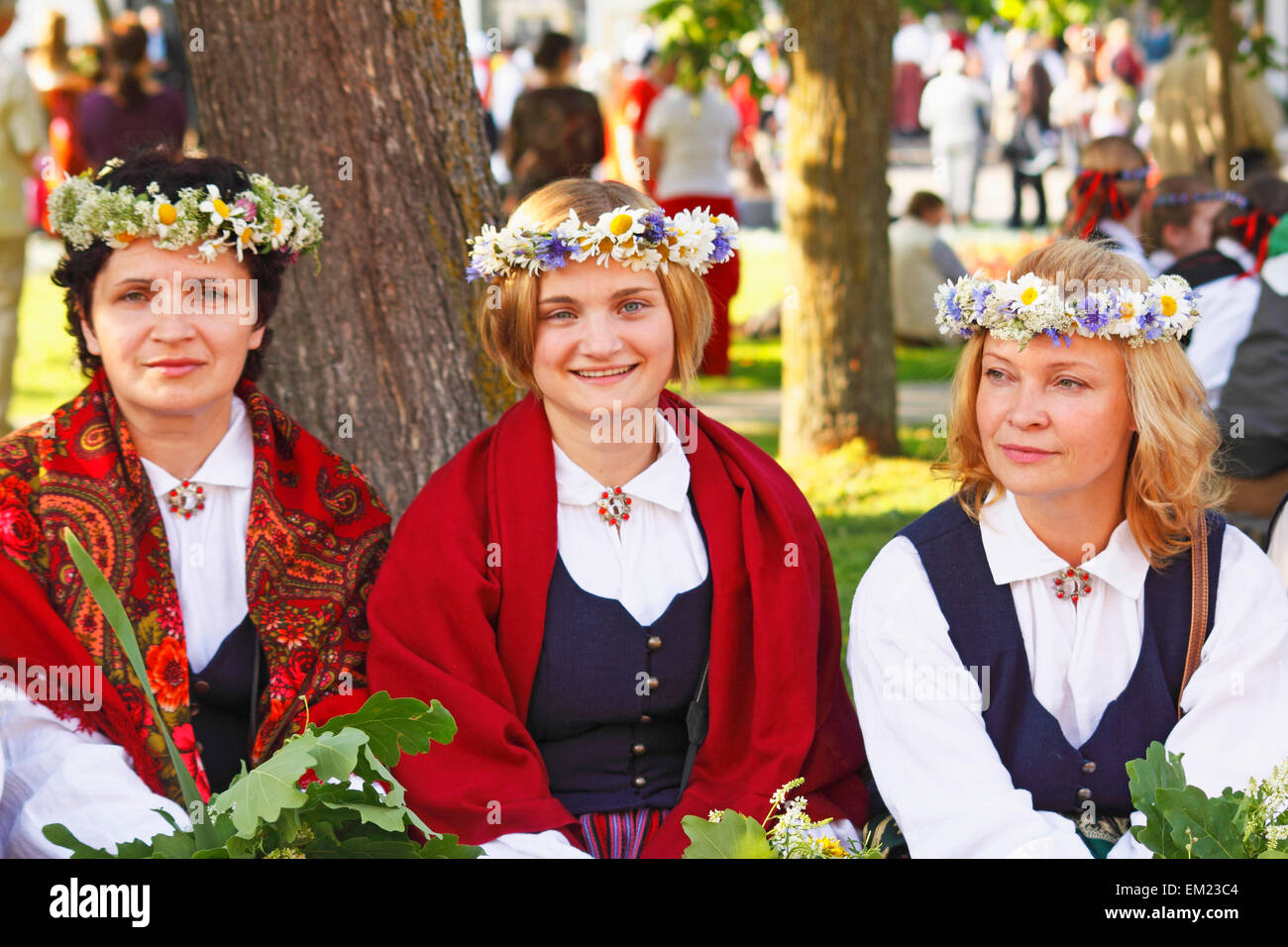 Three Women Dressed For Midsummer's Eve Festival; Jurmala Latvia Stock Photo