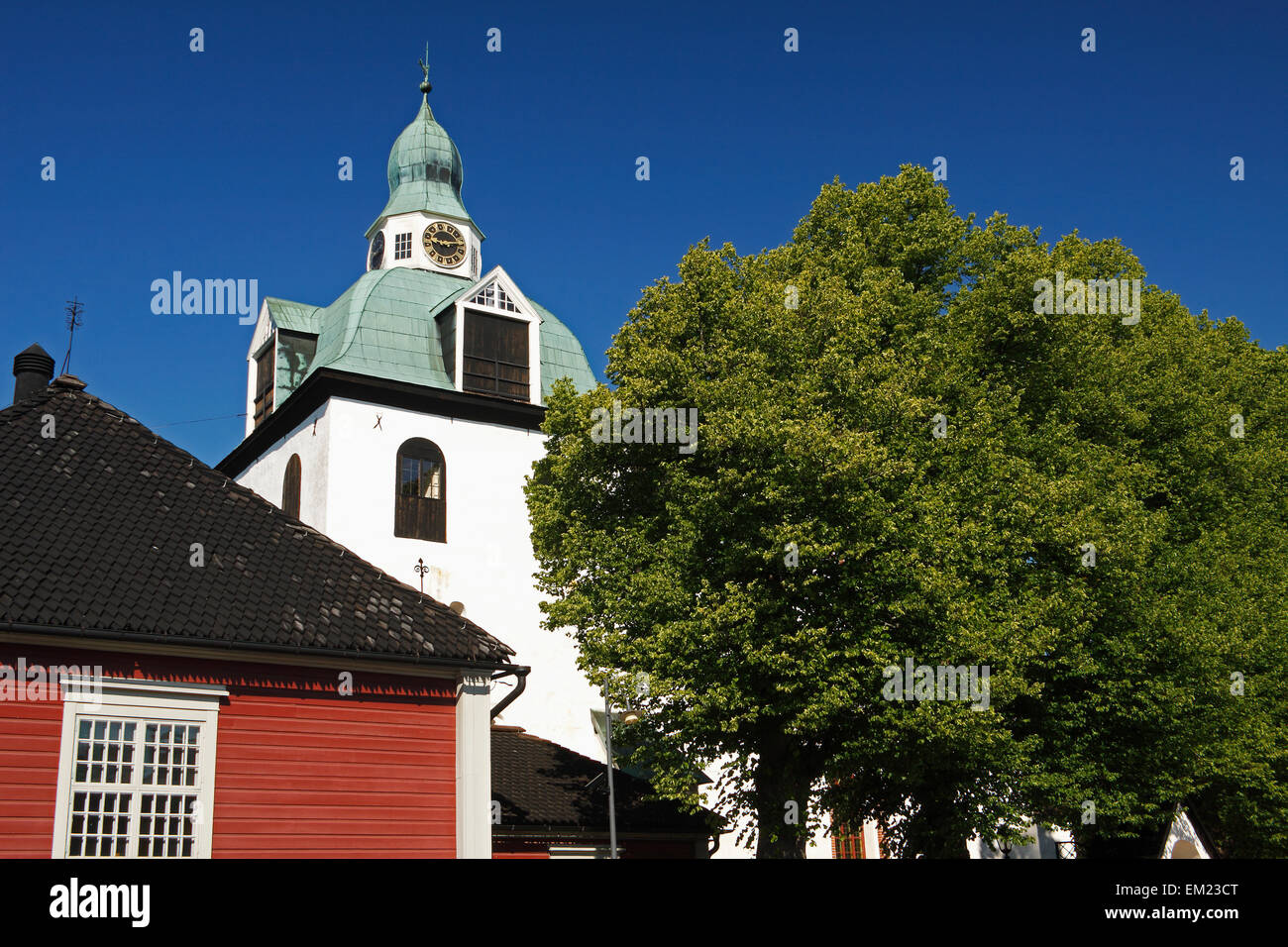 Painted House And A Church In The Old Town; Porvoo Finland Stock Photo