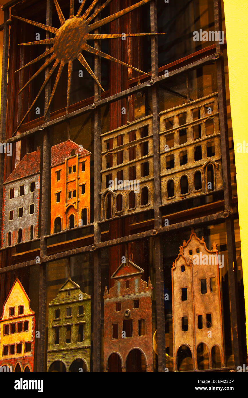 Metal Cut Out Picture Of Houses On A Window Frame In The Old Town; Chesky Krumlov Jihocesky Czech Republic Stock Photo