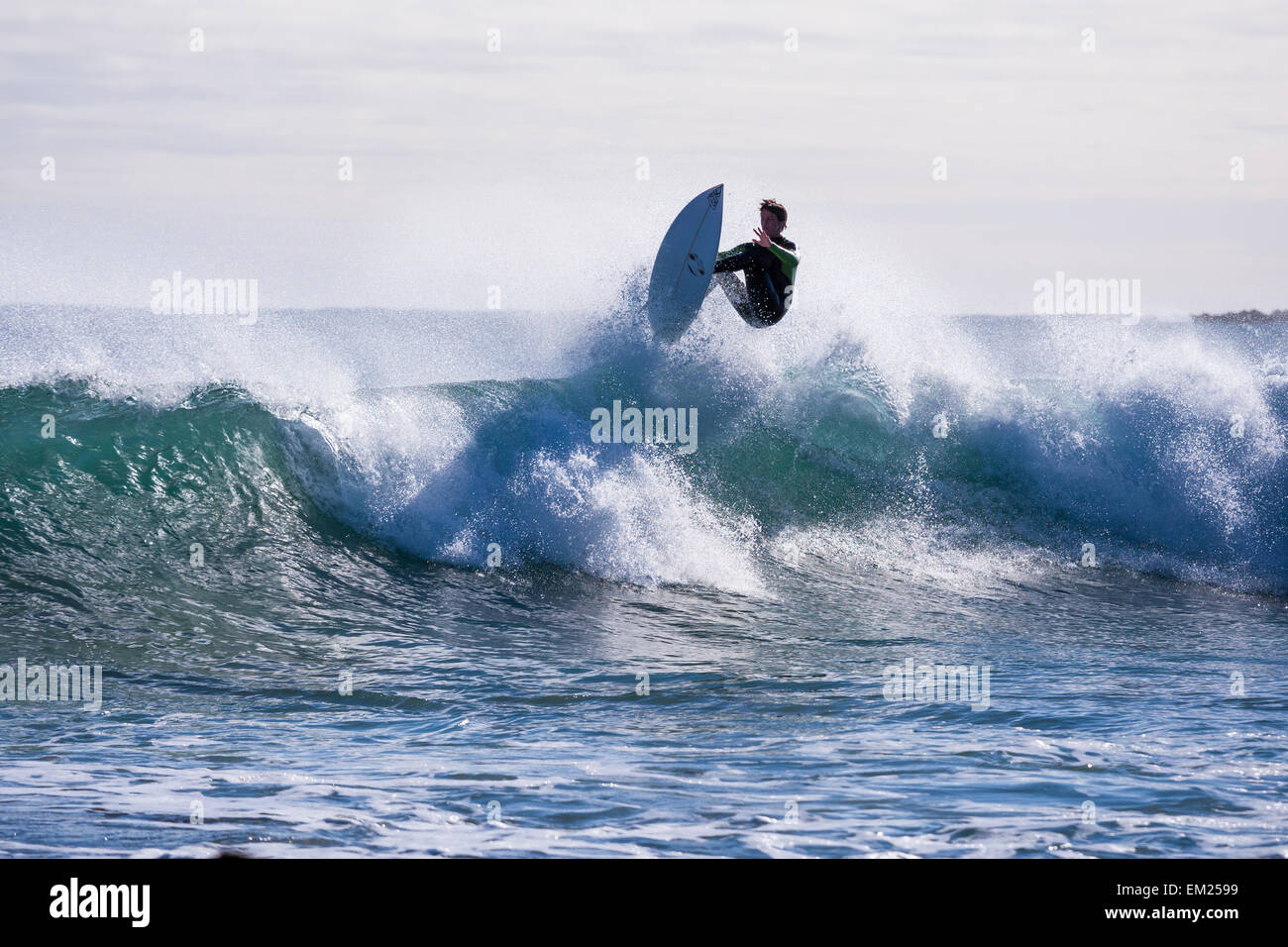 Surfer airing waves at Marrawah. Stock Photo