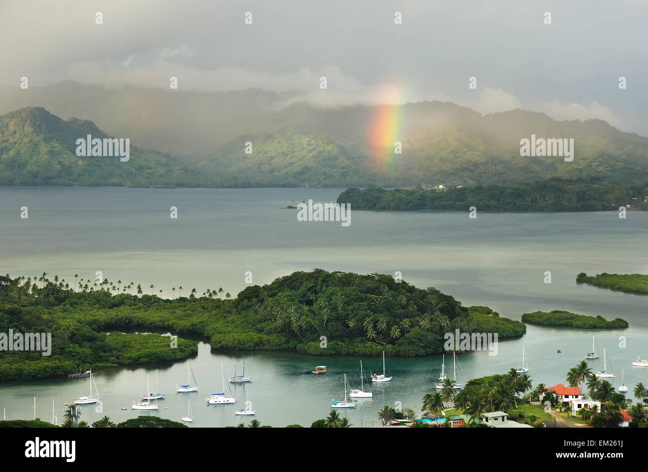 Savusavu marina and Nawi islet with rainbow, Vanua Levu island, Fiji, South Pacific Stock Photo