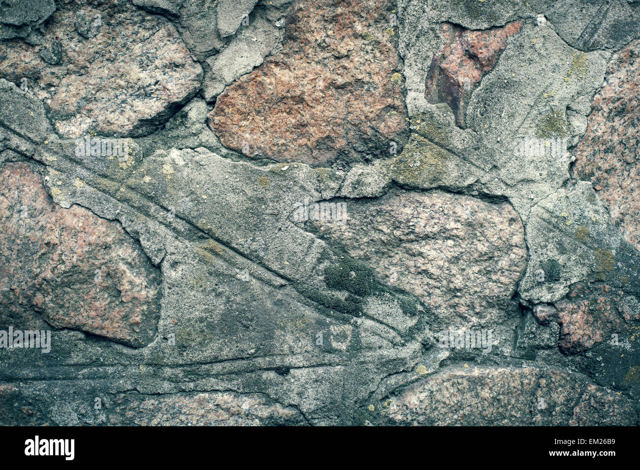 Wall. Natural granite stone texture background. Rough and rusty. Close