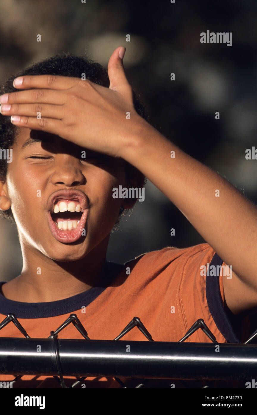 A young African American boy making a funny face Stock Photo Alamy