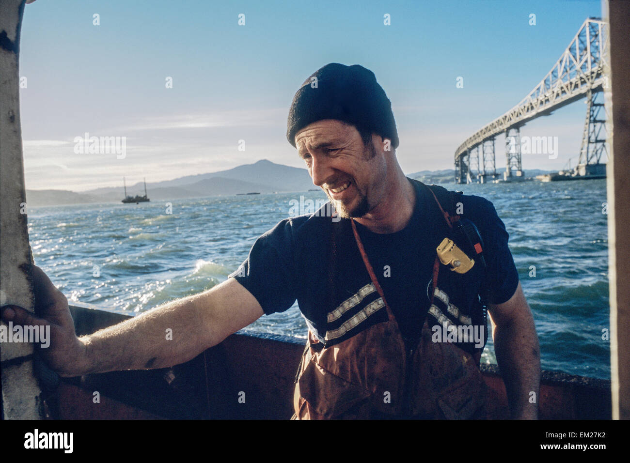 A deckhand on a tugboat. Stock Photo