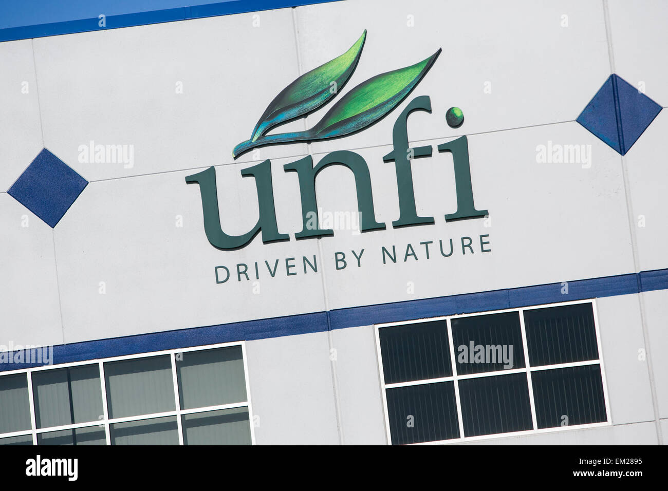 A logo sign outside a facility operated by United Natural Foods, Inc. (UNFI), in York, Pennsylvania Stock Photo