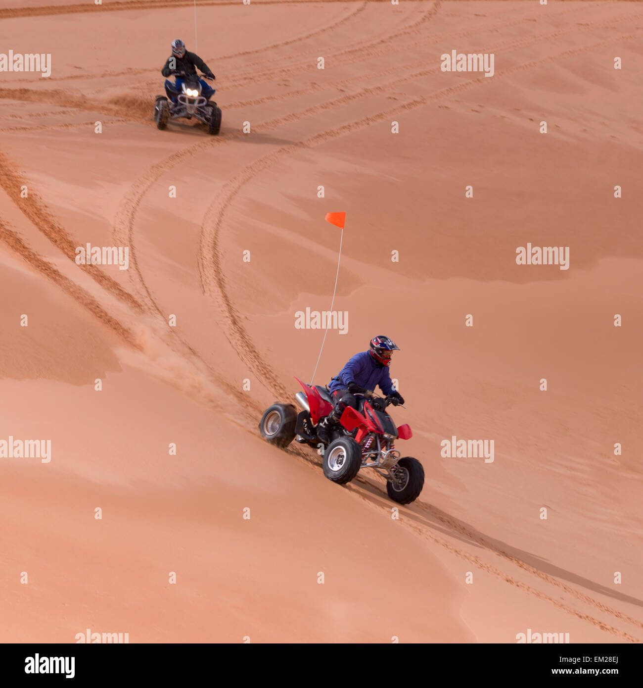 Riding Quads On Sand Dunes; Utah United States Of America Stock Photo