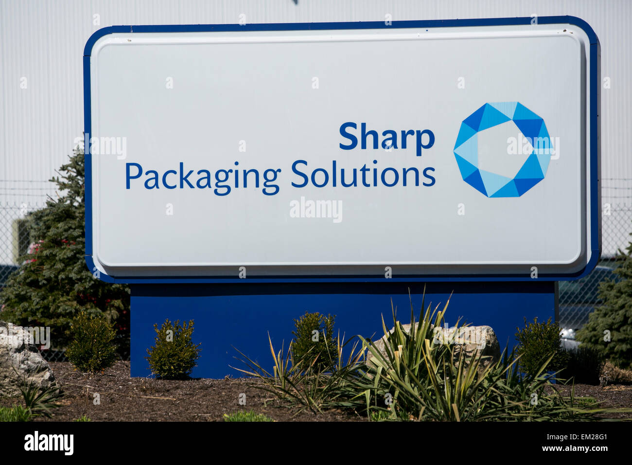 A logo sign outside of a facility operated by Sharp Packaging Solutions in Allentown, Pennsylvania. Stock Photo