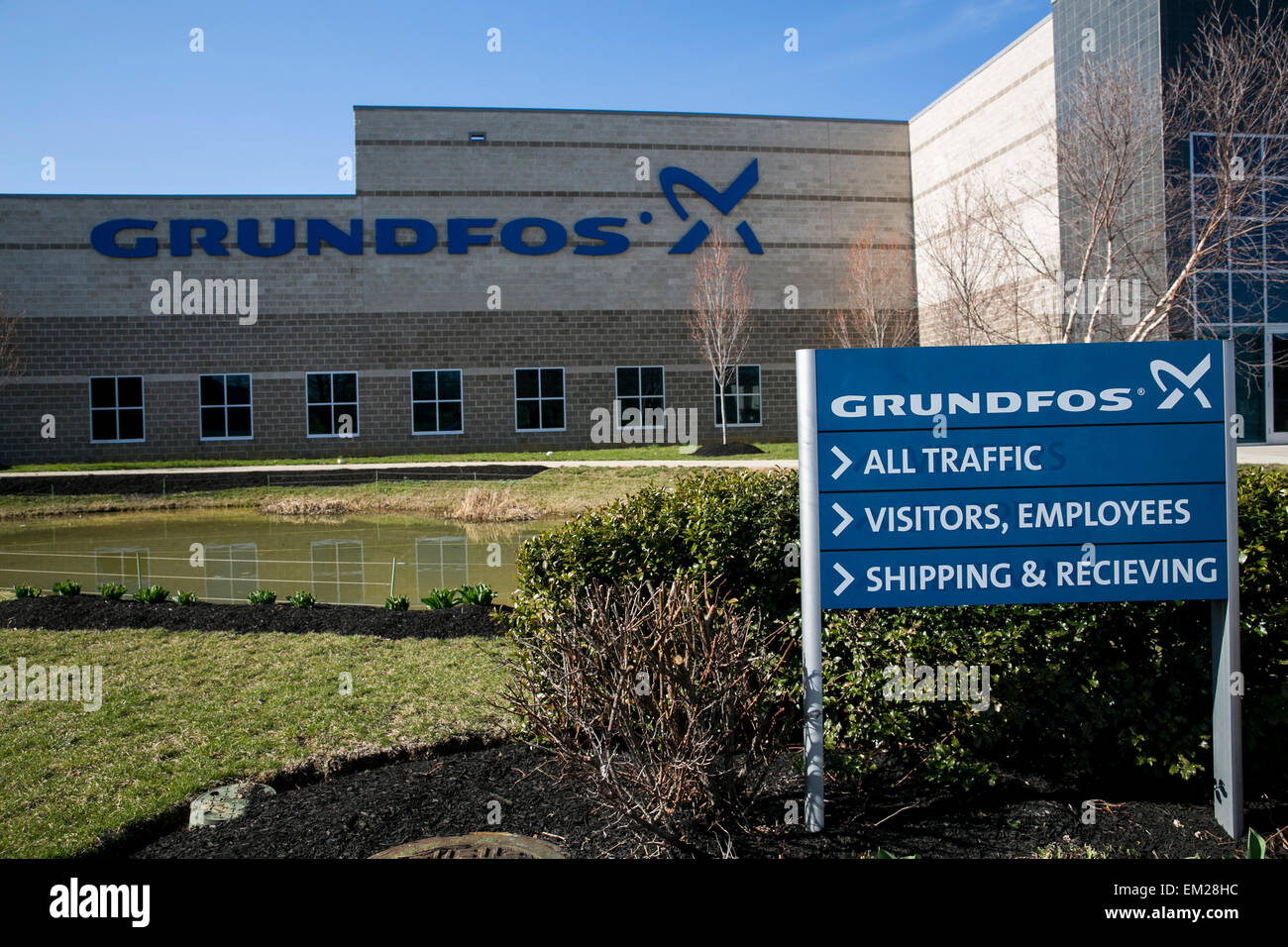 A logo sign outside of a facility operated by Grundfos in Allentown, Pennsylvania. Stock Photo