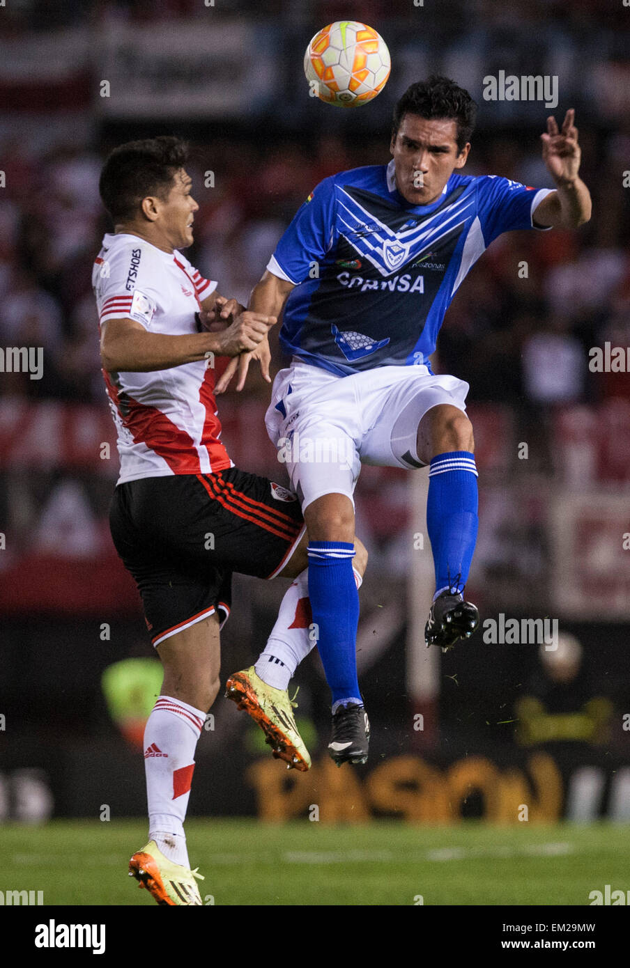 Buenos Aires, Argentina. 15th Apr, 2015. River Plate's Teofilo Gutierrez (L) of Argentina vies for the ball with San Jose's Gabriel Valverde of Bolivia during the match of Copa Libertadores in the Monumental Stadium in Buenos Aires, Argentina, April 15, 2015. River Plate won the game 3-0. © Martin Zabala/Xinhua/Alamy Live News Stock Photo