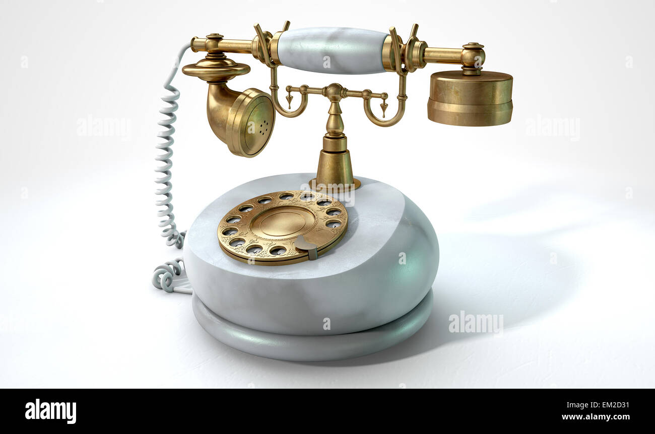 A vintage marble and brass telephone with a handset and dial embellishments on an isolated white studio background Stock Photo