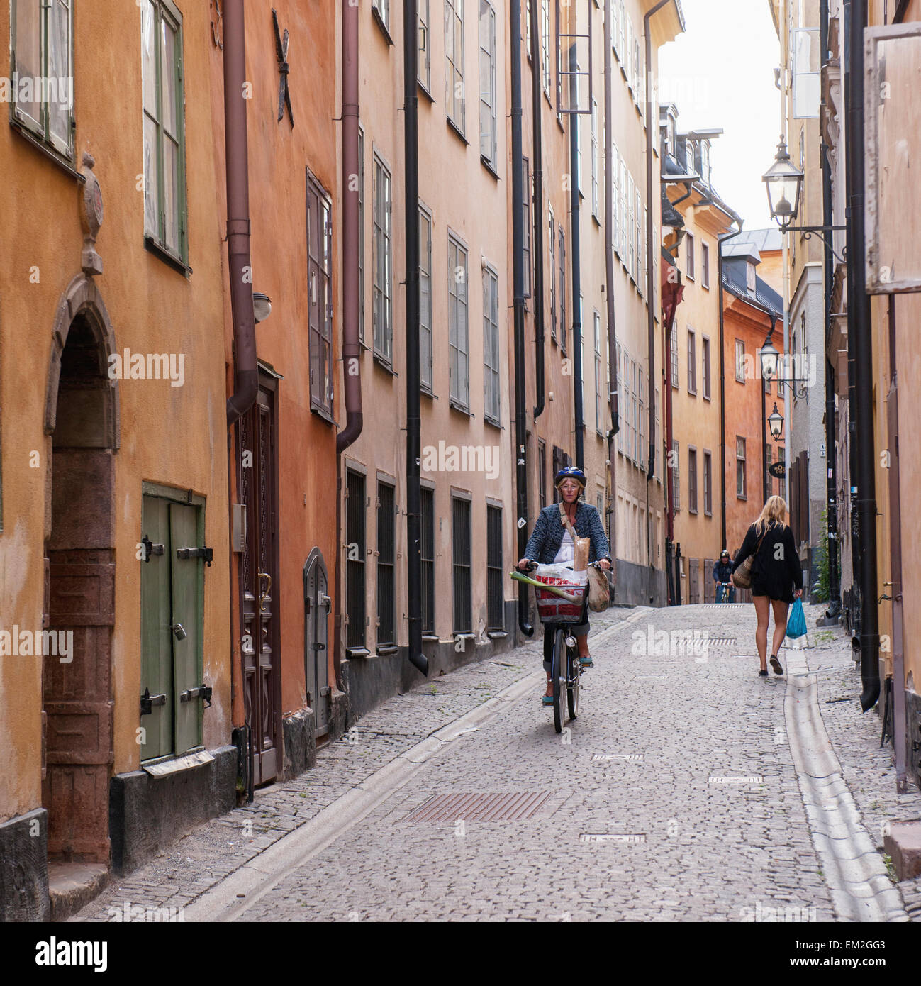 Pedestrian And Cyclists On A Narrow Street; Stockholm Sweden Stock Photo