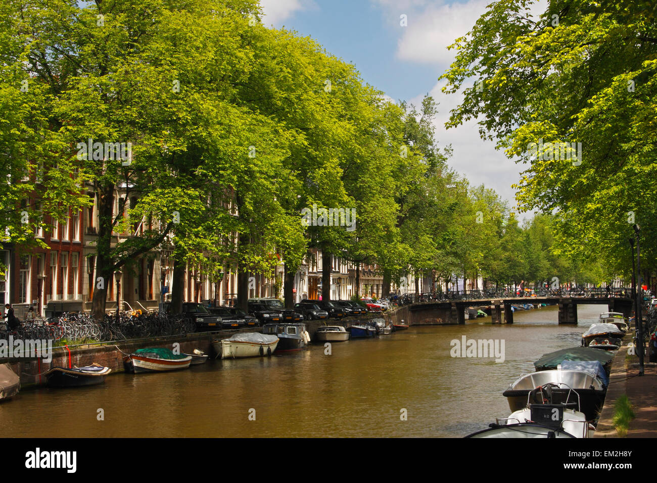 Boats In The Singel Canal; Amsterdam North Holland Netherlands Stock Photo