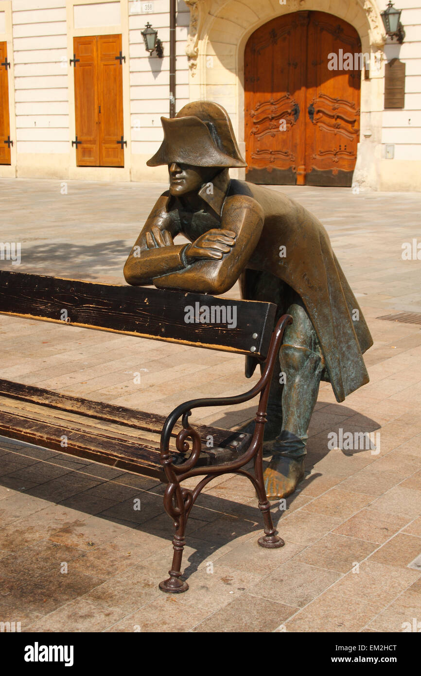 Bronze Statue Of A Soldier Leaning On A Bench In Front Of The French Embassy; Bratislava Slovakia Stock Photo