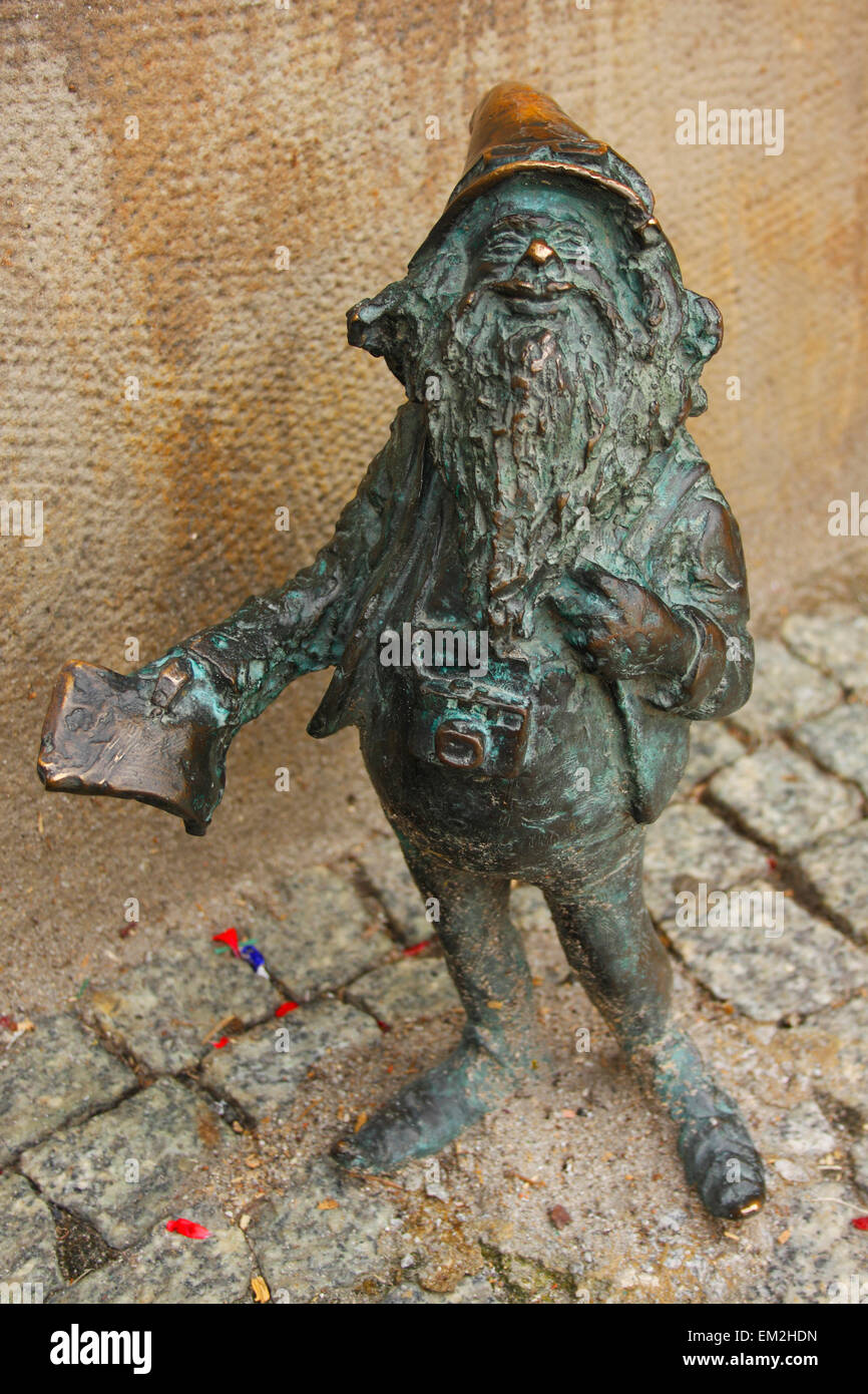 Bronze Sculpture Of A Gnome Outside The Tourist Office; Wroclaw Poland Stock Photo