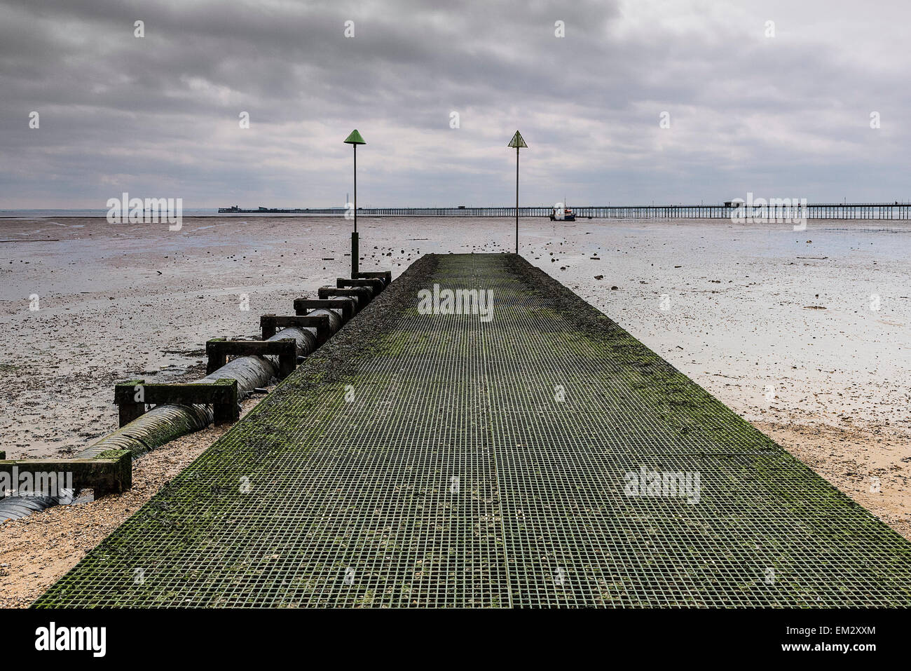 An empty jetty on Southend seafront on a cloudy day. Stock Photo
